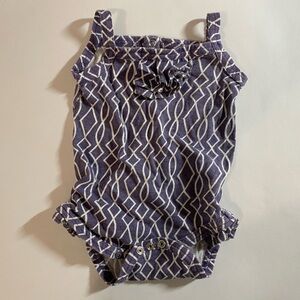 Kate Quinn Organics onesie with ruffle.